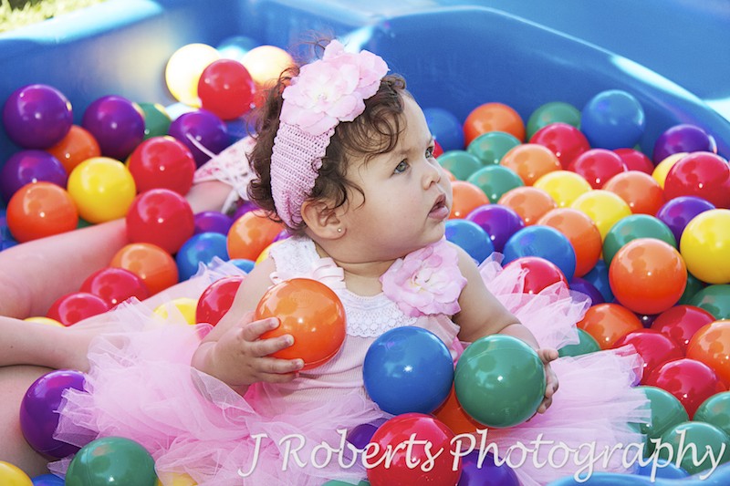 Birthday girl in the ballpit - Party Photography Sydney